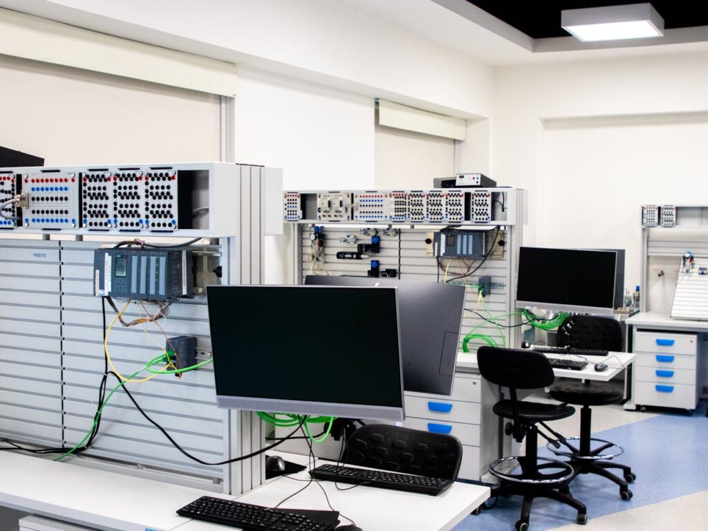 pexels-photo-18471533 A contemporary computer lab with advanced workstations and electronic equipment, perfect for research and development.